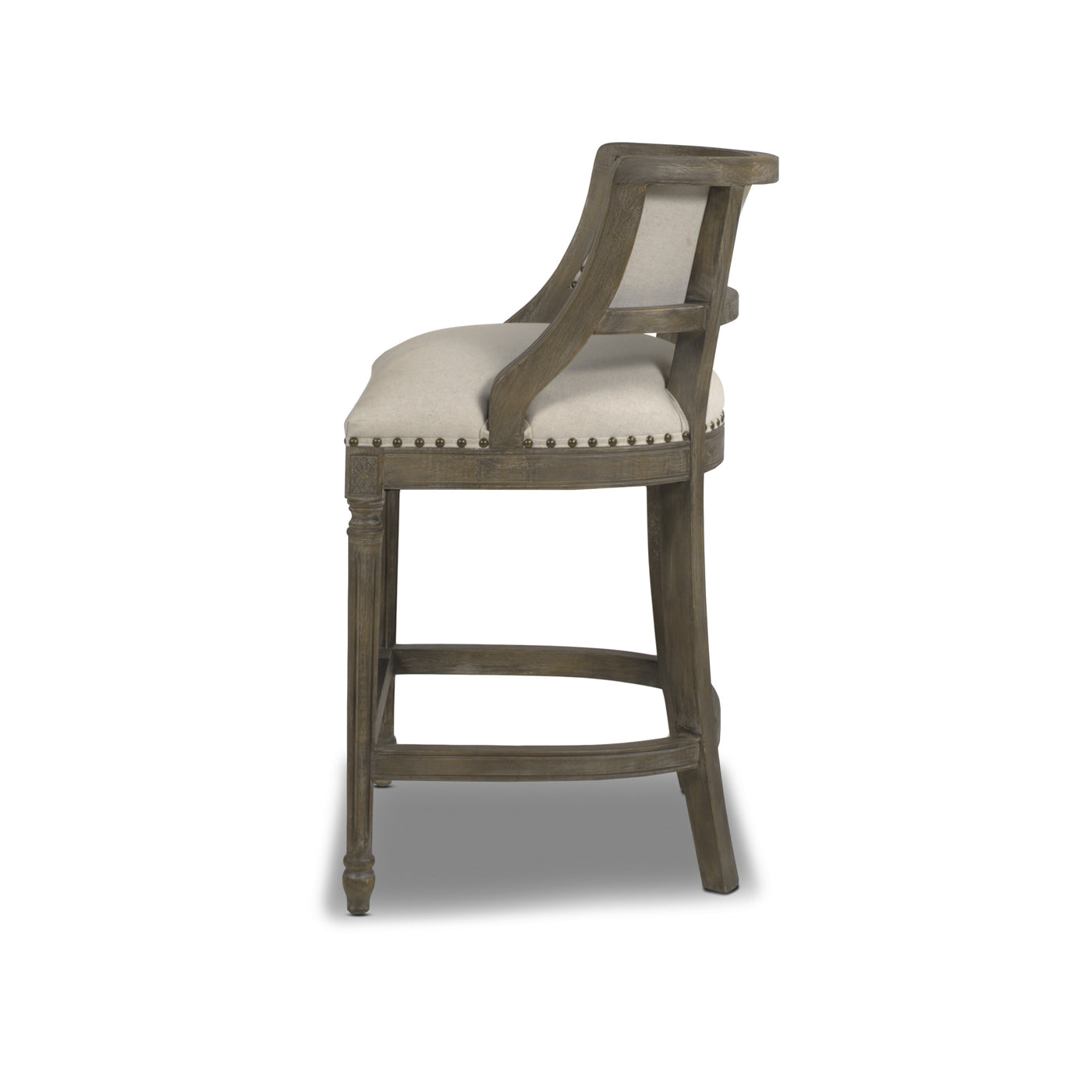 Upholstered wooden bar stool with light beige seat and carved details