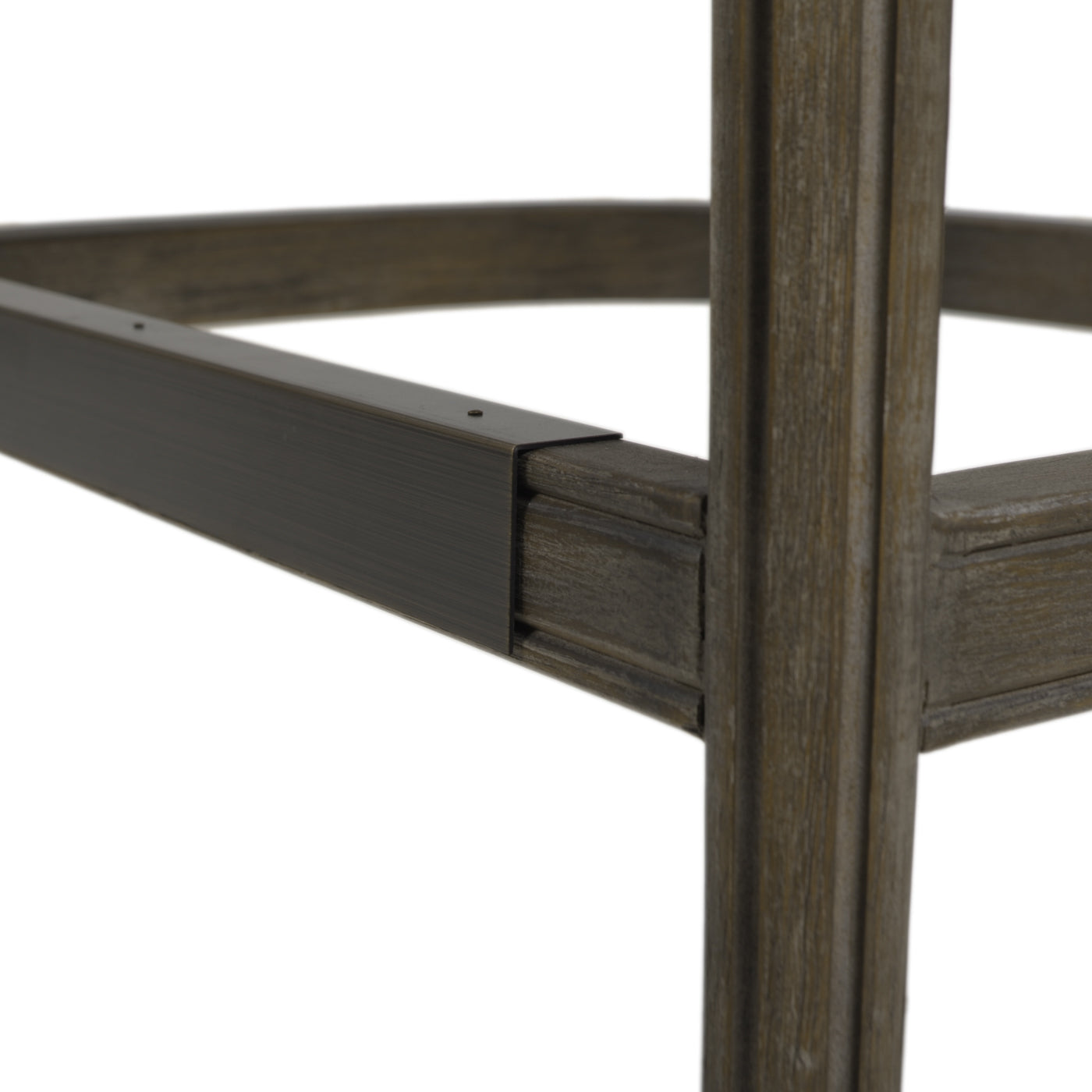 Closeup of distressed wood frame and dark metal support on a bar stool