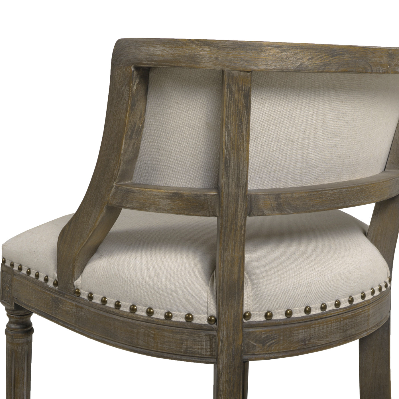 Distressed wood accent chair with natural linen upholstery and brass nailhead trim detail