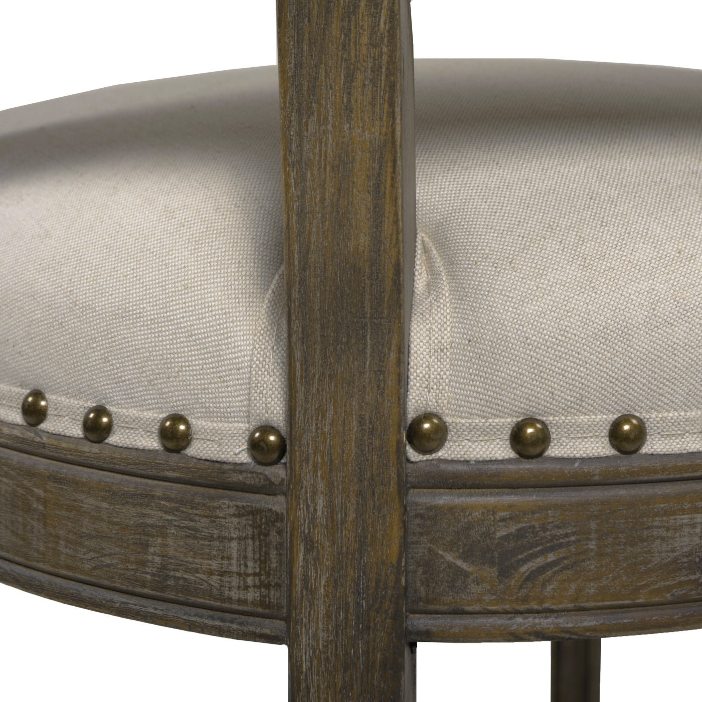 Textured linen upholstered bar stool with antique brass nailhead trim and distressed wood frame