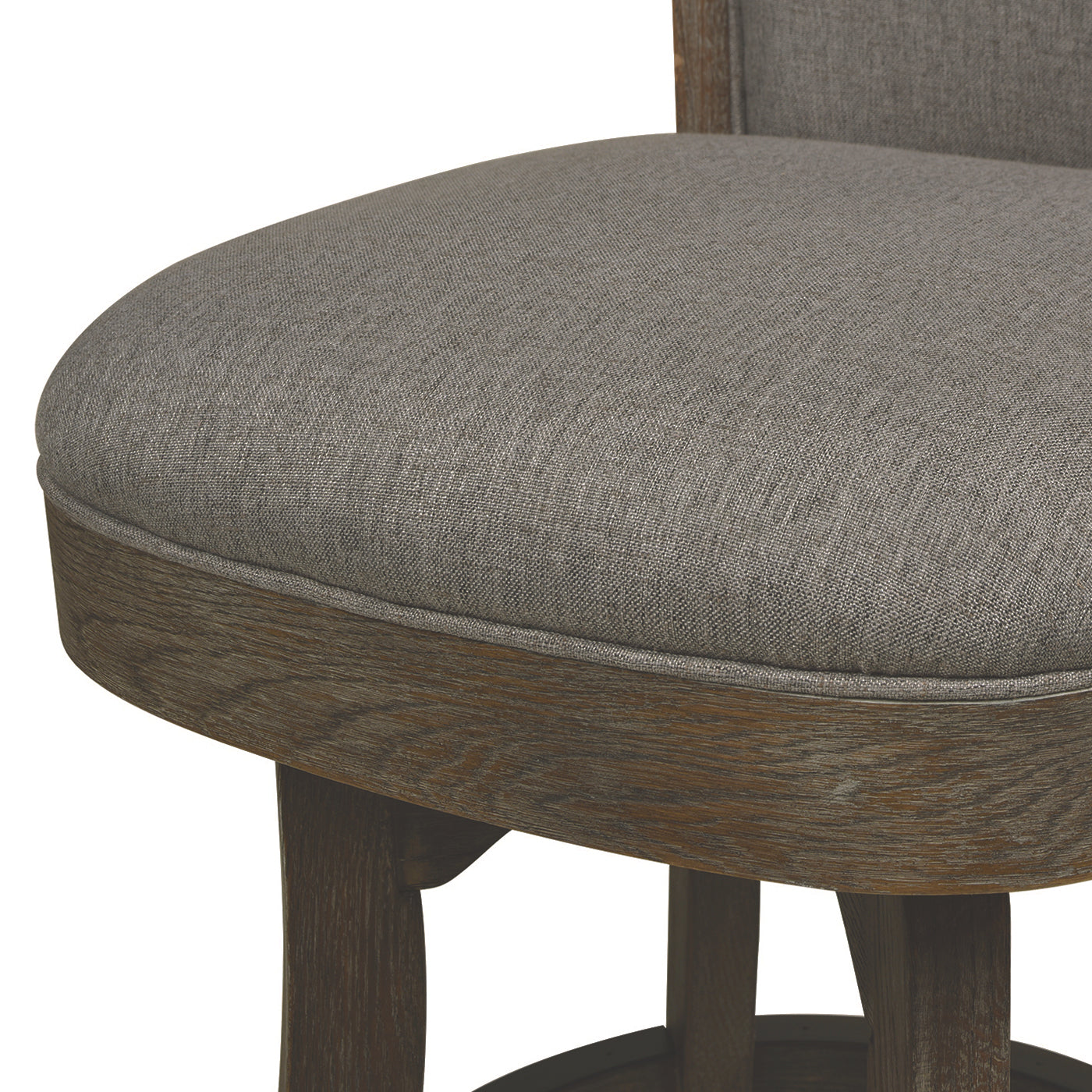Upholstered grey fabric seat and weathered wood base of a modern swivel bar stool