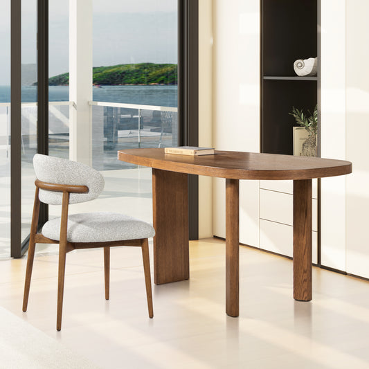 Oval wood dining table with modern armchair for home office