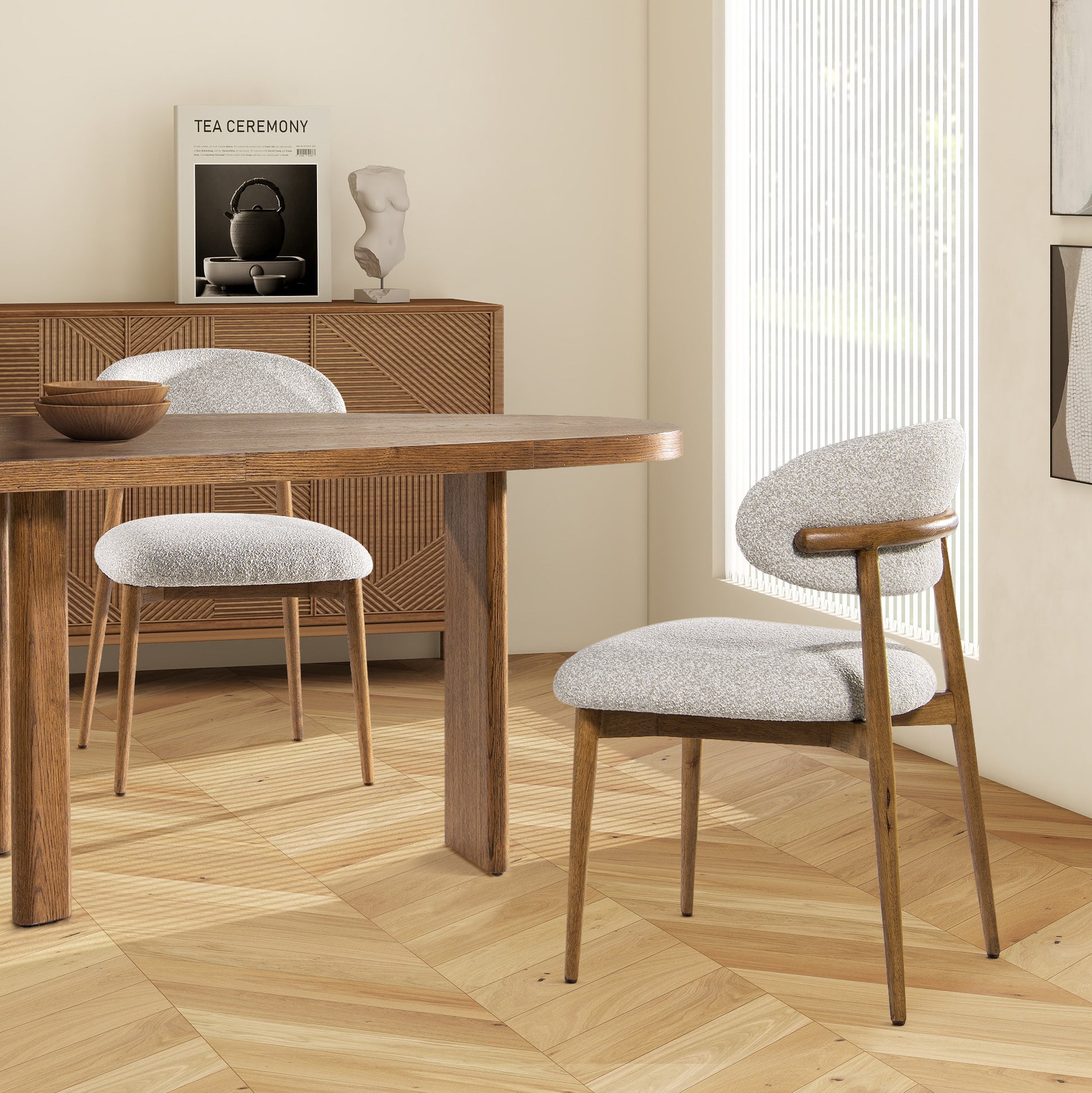 Textured boucle dining chair with natural wood frame and curved back
