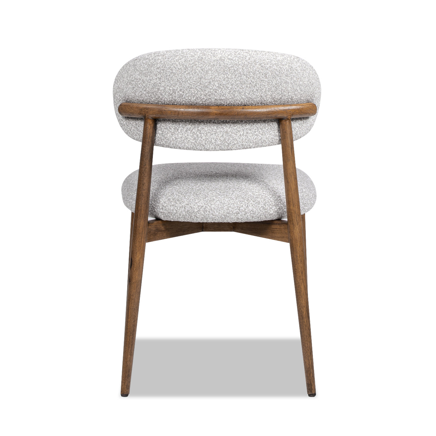 Textured grey fabric dining chair with natural wood frame and curved back