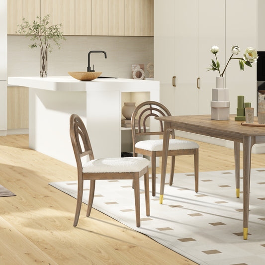 Elegant curved back dining chairs with plush white boucle seats perfect for modern kitchens