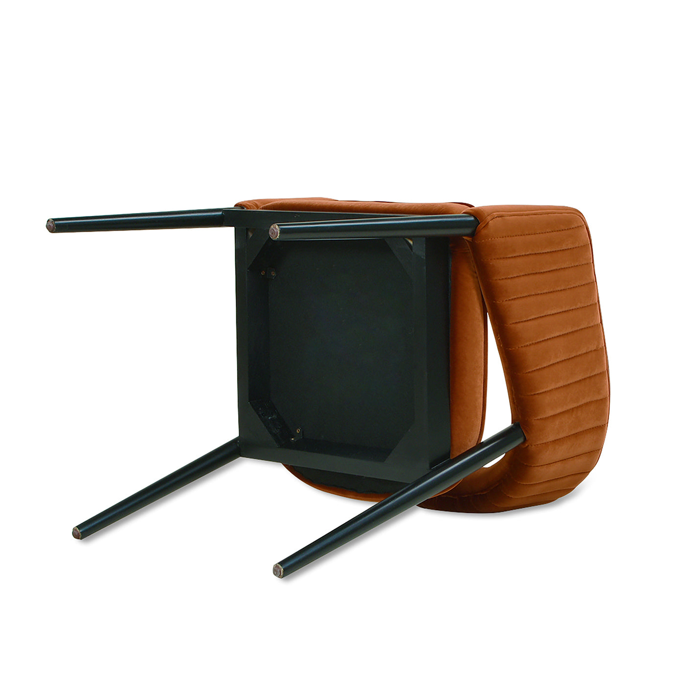 Caramel ribbed velvet accent chair with black metal legs viewed upside down