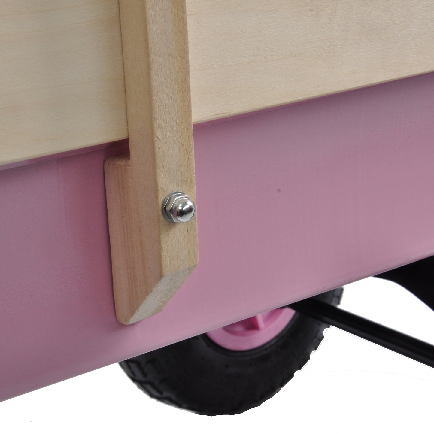 Pink wagon bed with wooden accents and black tire