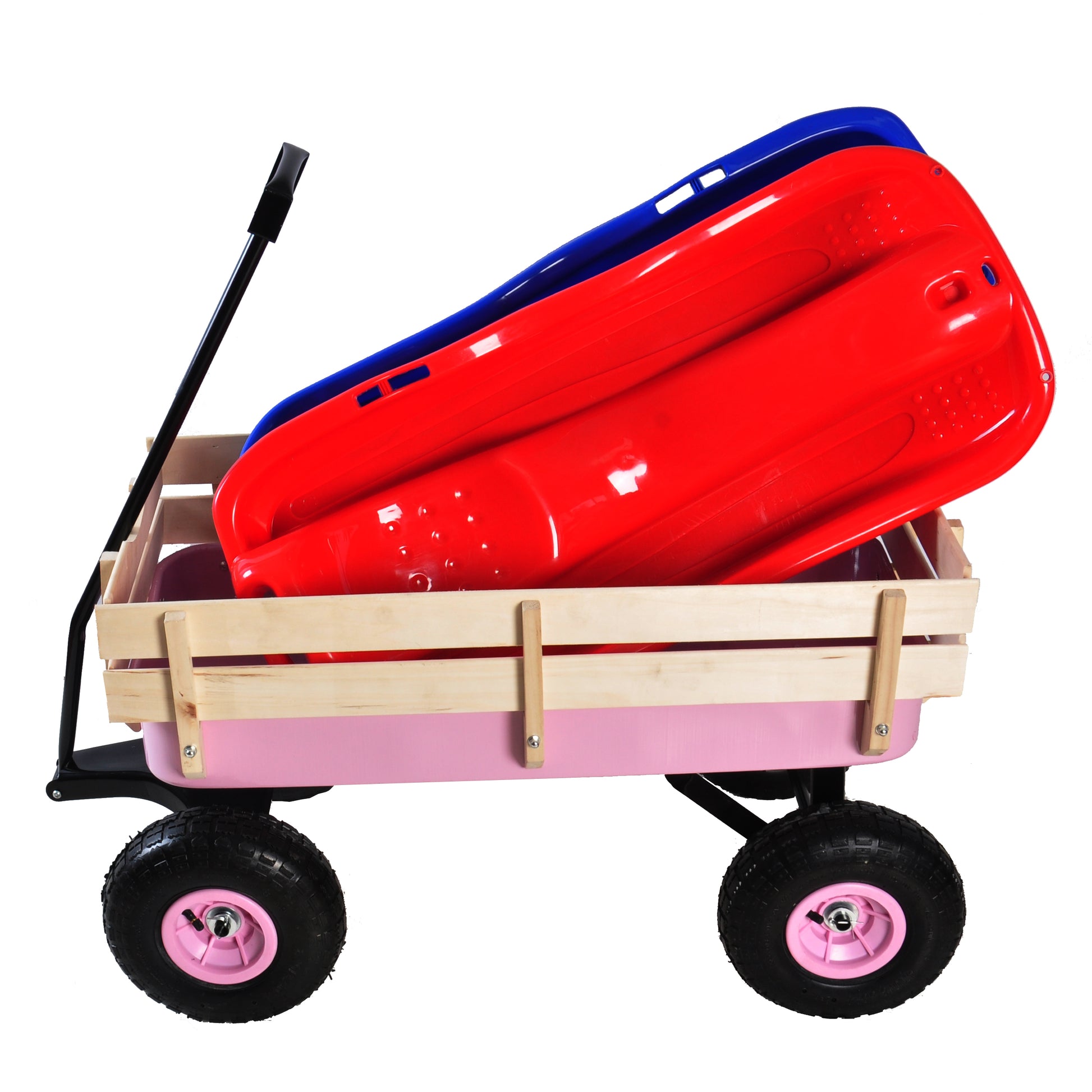 Red and blue plastic sleds stacked in a pink wooden wagon with black wheels