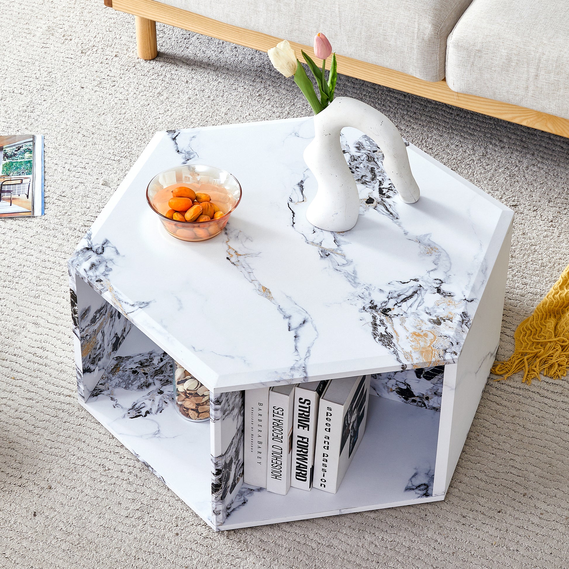 Geometric marble coffee table with gold veining and internal shelf for books