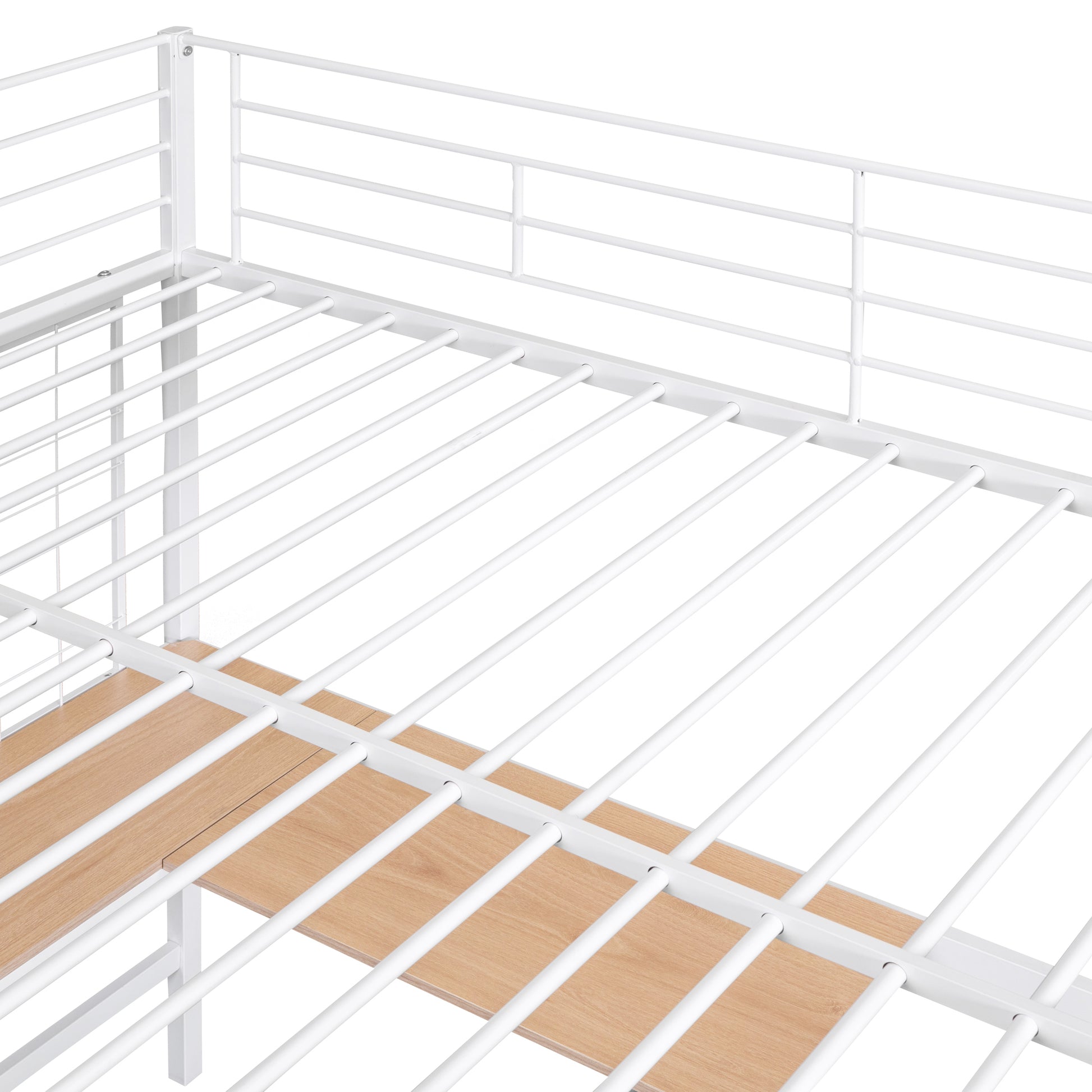 Closeup of white metal bunk bed frame with wooden slat supports