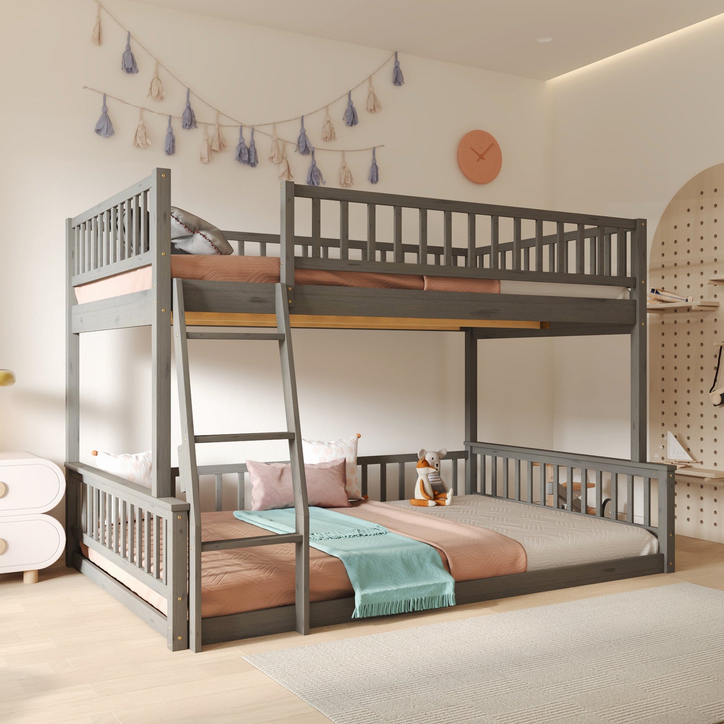 Gray wooden triple bunk bed with guardrails and a ladder