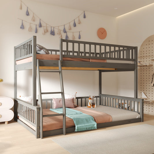 Gray wooden triple bunk bed with guardrails and a ladder