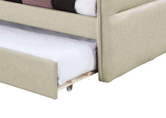 Beige upholstered daybed with a pullout trundle bed on wheels