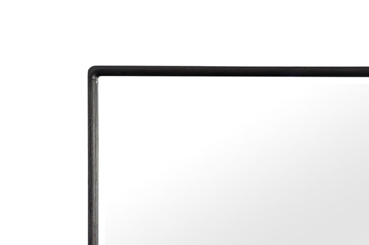 Detail of a modern dark wood framed mirror with a clean minimalist design