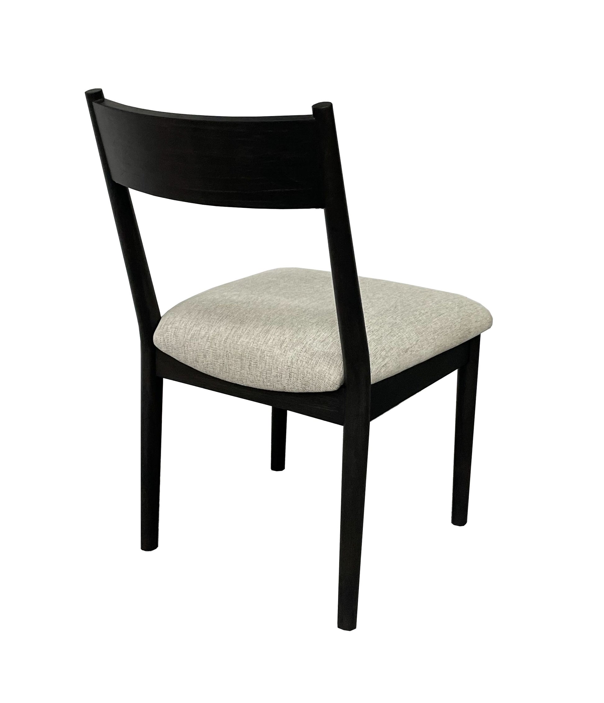 Modern black wooden chair with light gray upholstered seat angled back