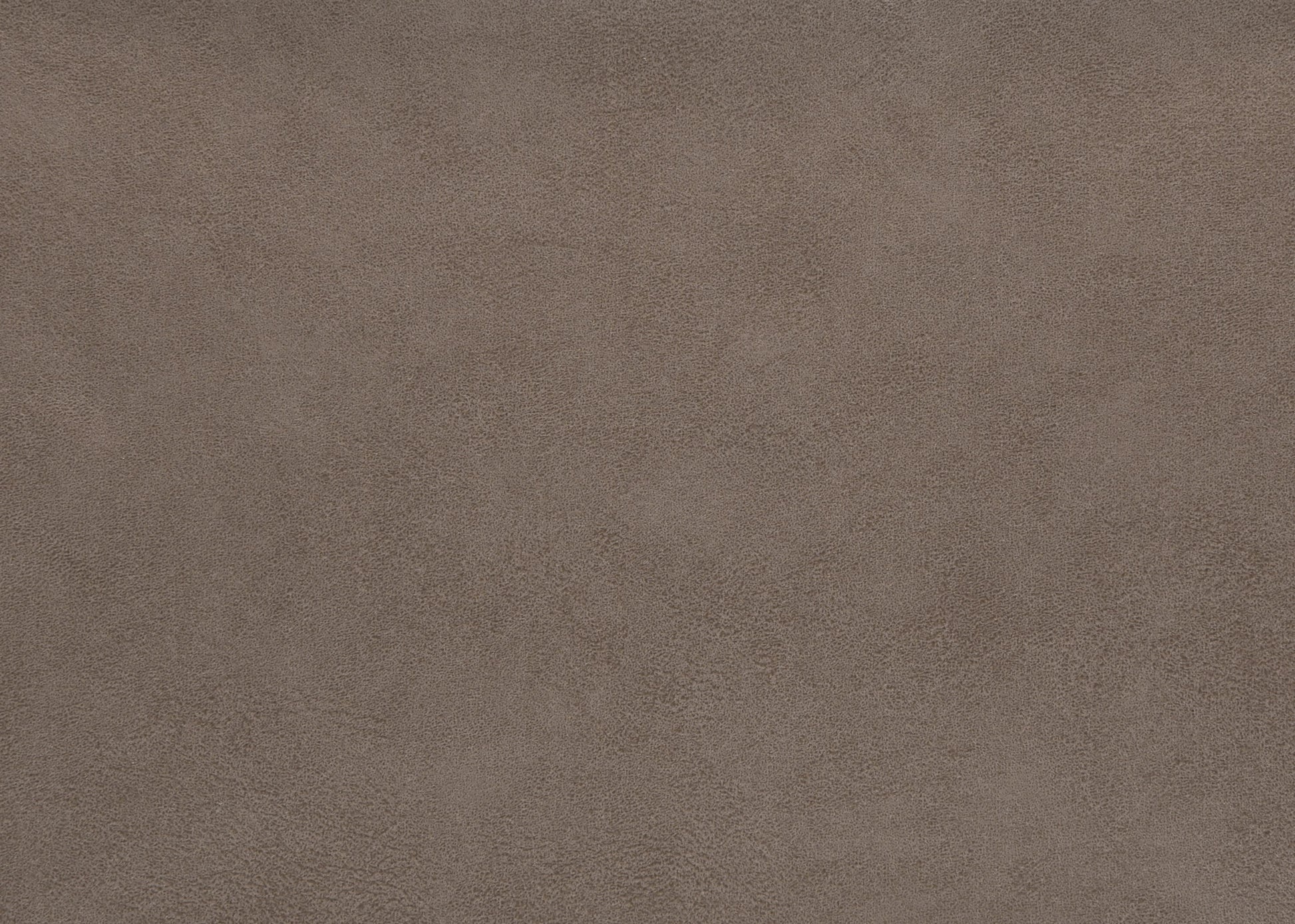 Closeup of taupe suede fabric texture with a soft matte finish