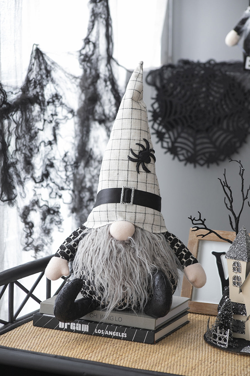 Halloween gnome with plaid hat and spider accent for spooky decor