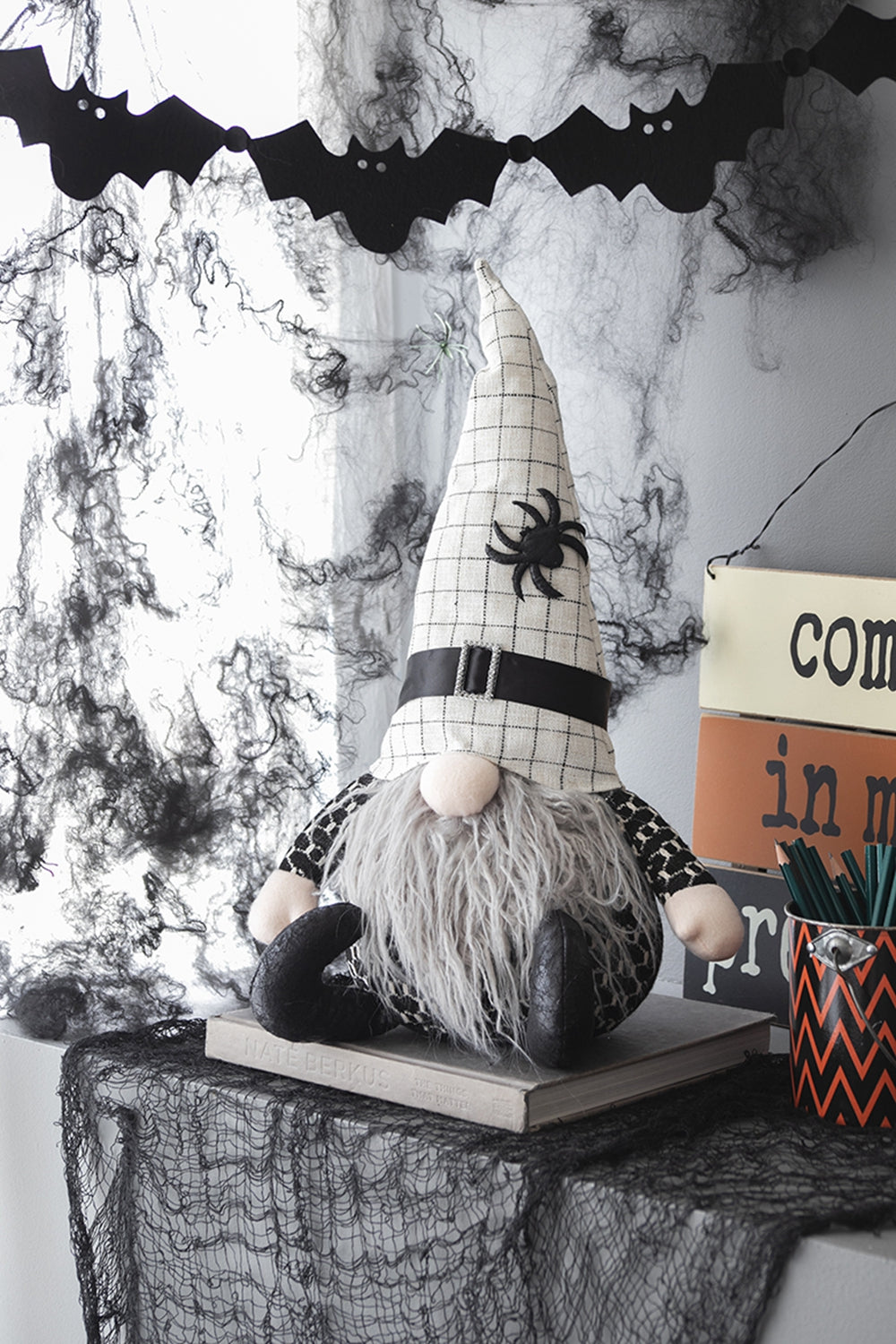 Textile Halloween gnome with black spider on checkered hat and grey beard