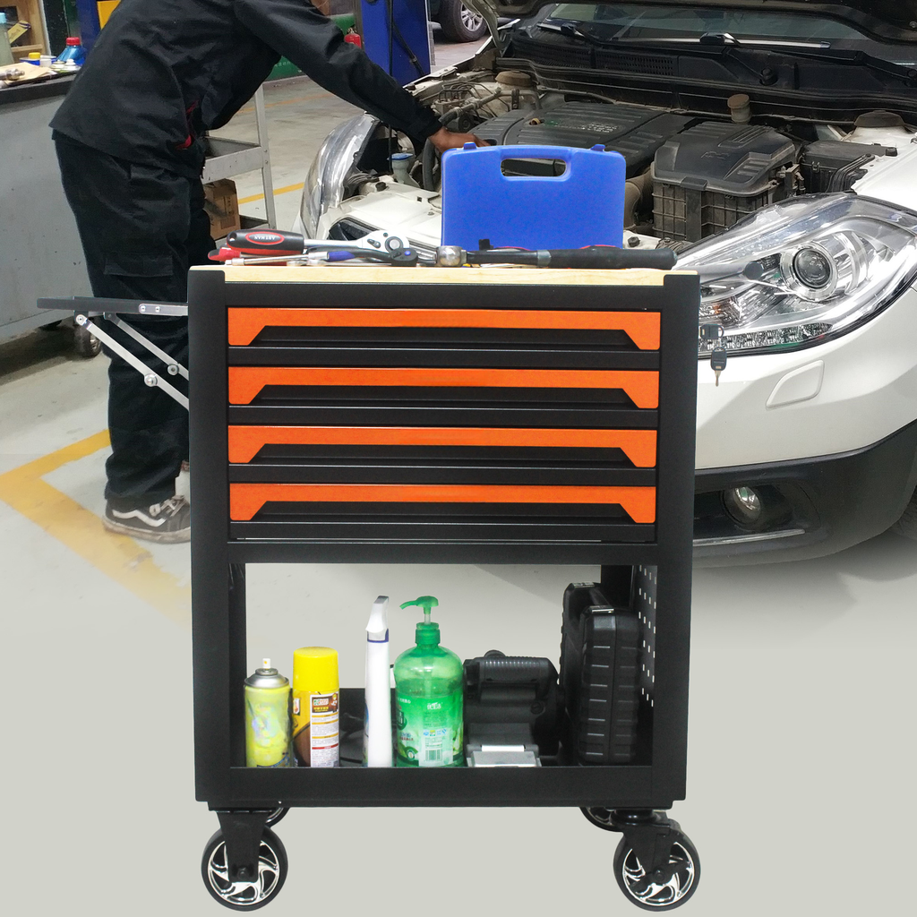 Black rolling tool chest with orange drawer accents ideal for garage organization