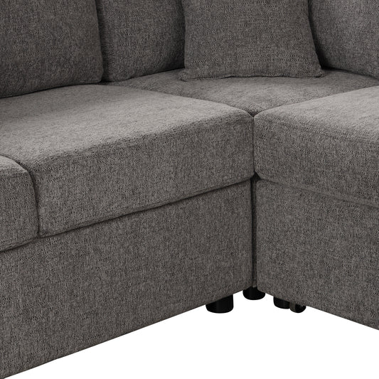 Closeup view of a textured charcoal grey fabric sofa section highlighting plush cushions and modern design