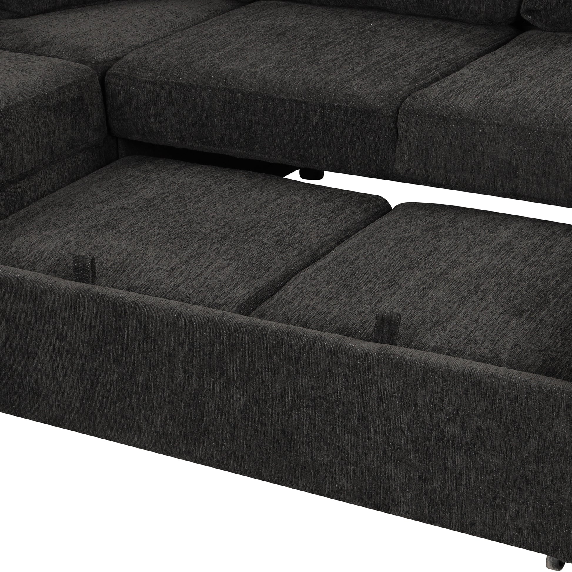 Dark grey sectional sofa with textured fabric upholstery and hidden storage compartments