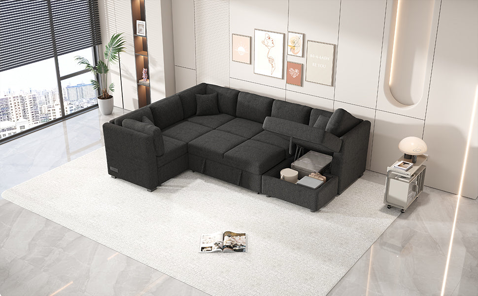 Dark gray sectional sofa with hidden storage compartments and pullout bed in a modern living room