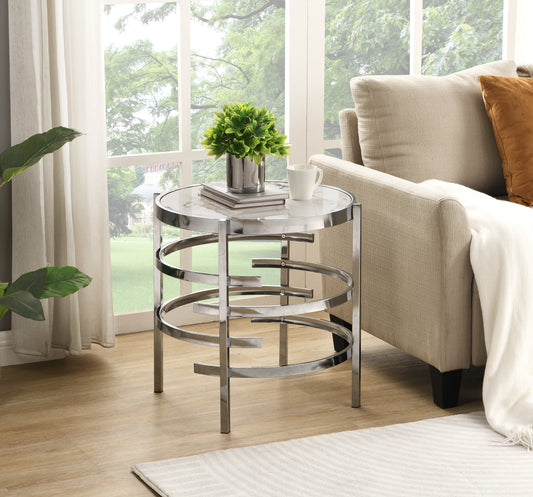Round marble top accent table with polished chrome base and spiral design