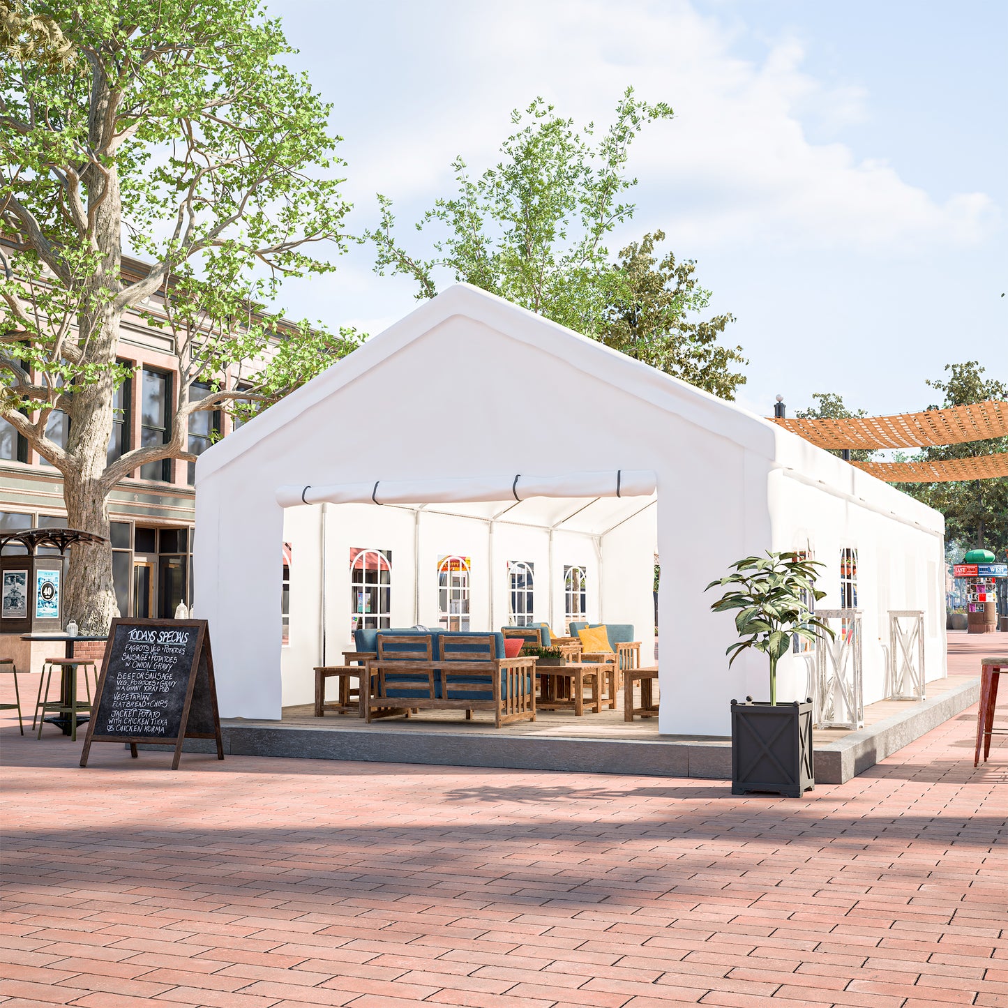 White event tent setup with outdoor seating and menu board