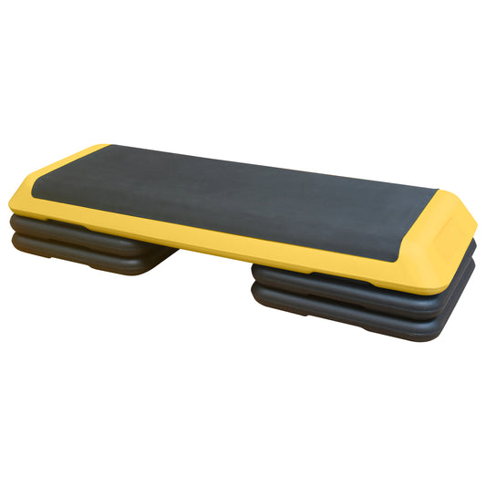 Adjustable aerobic step with nonslip black surface and yellow trim ideal for home workouts