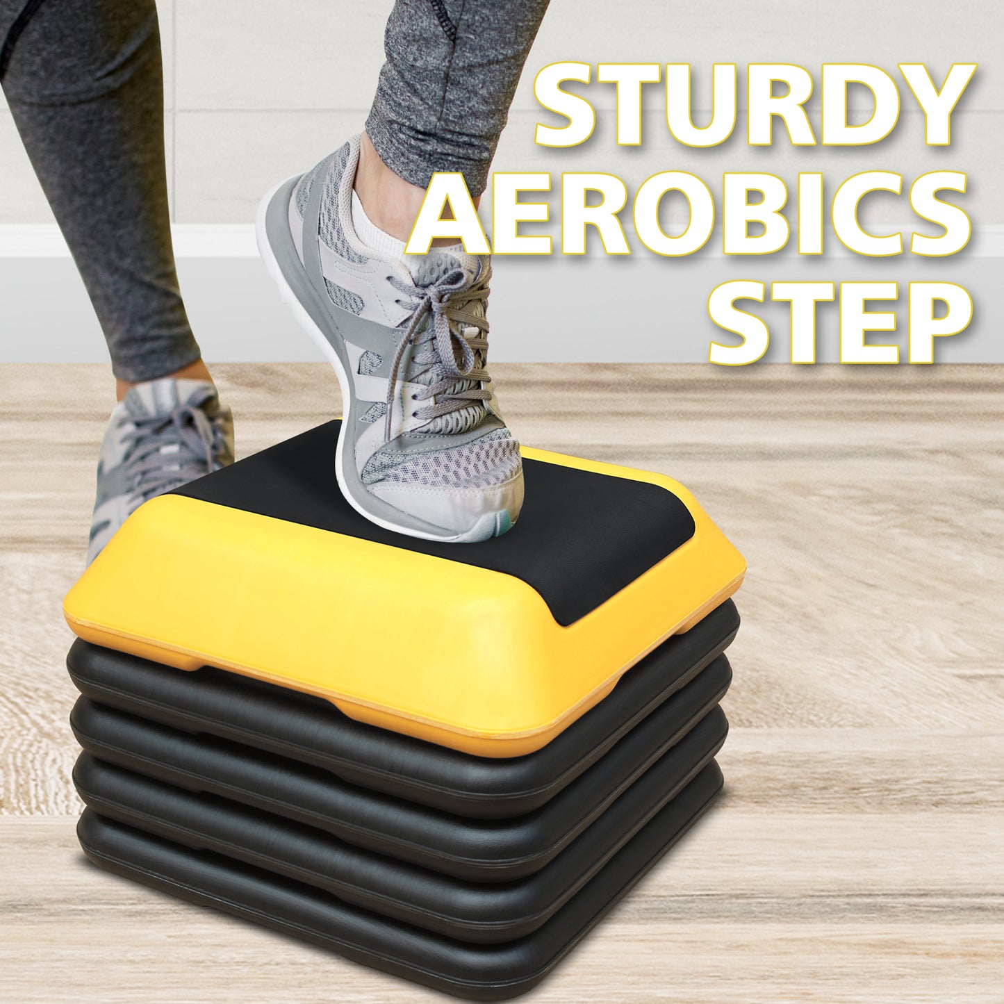 Adjustable yellow and black aerobics step stacked for workout