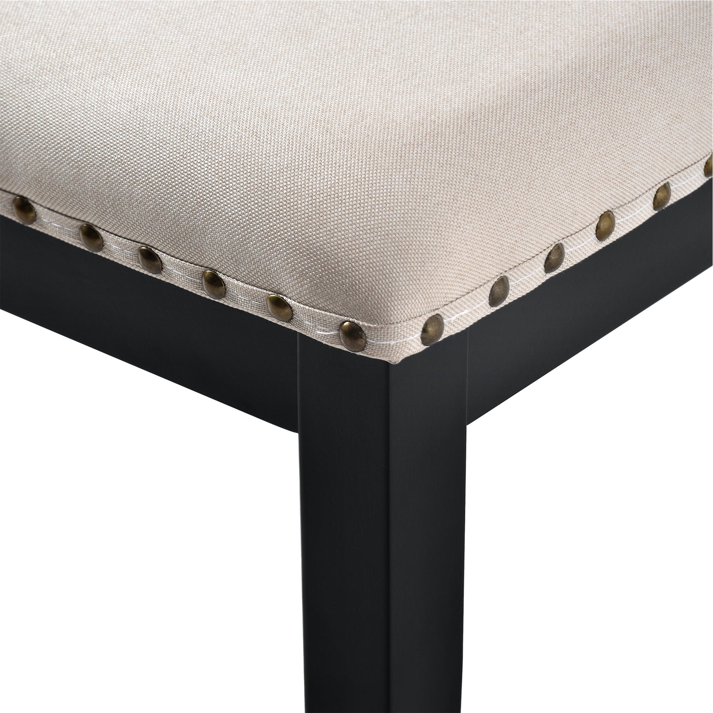 Beige linen upholstered bench with antique brass nailhead trim and black legs