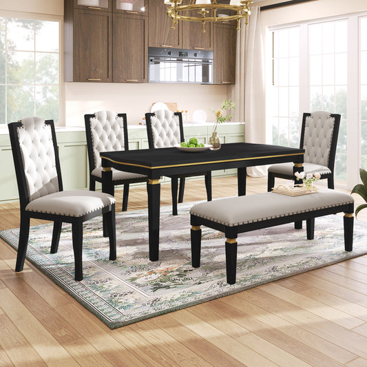 Tufted white upholstered dining chairs with black wood frames and gold accents