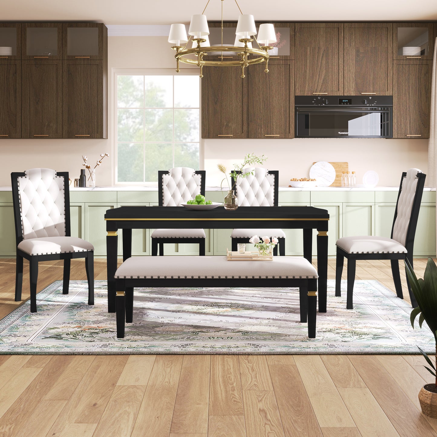 Black and white tufted dining chairs with nailhead trim and gold accents