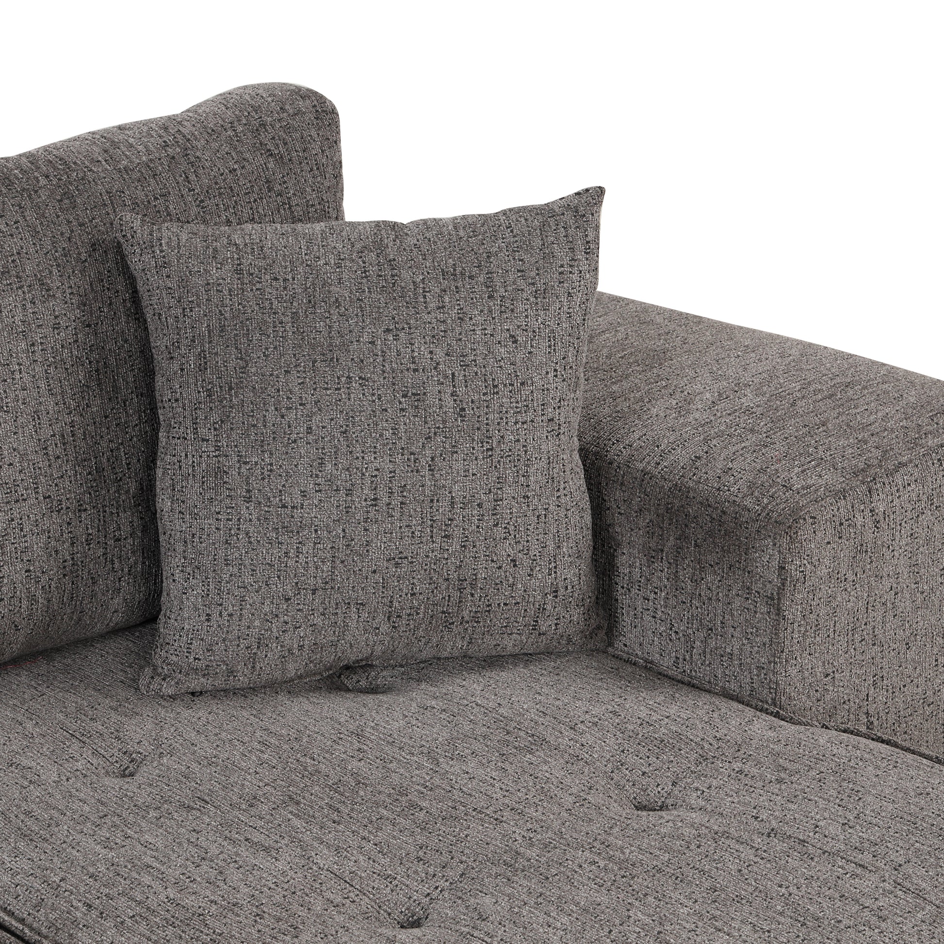Closeup of textured charcoal gray fabric on a modern sectional couch