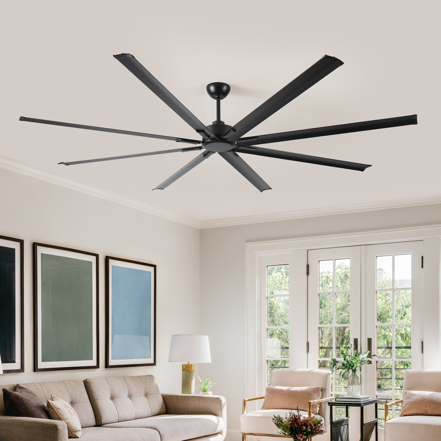 Modern black eightblade ceiling fan with sleek minimalist design installed on a white ceiling