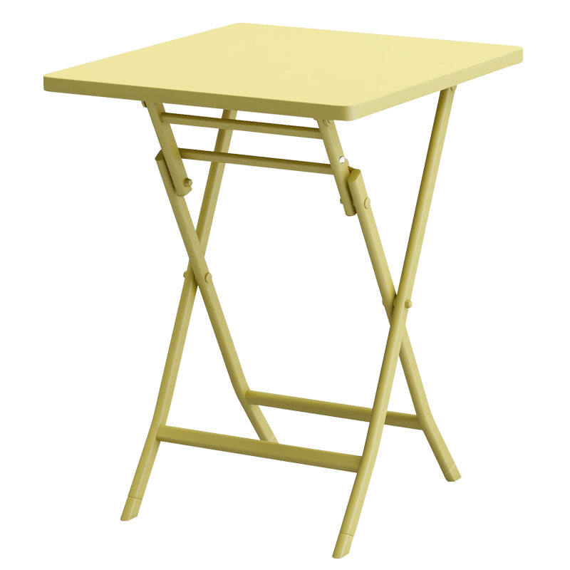 Yellow foldable side table with metal frame perfect for small spaces