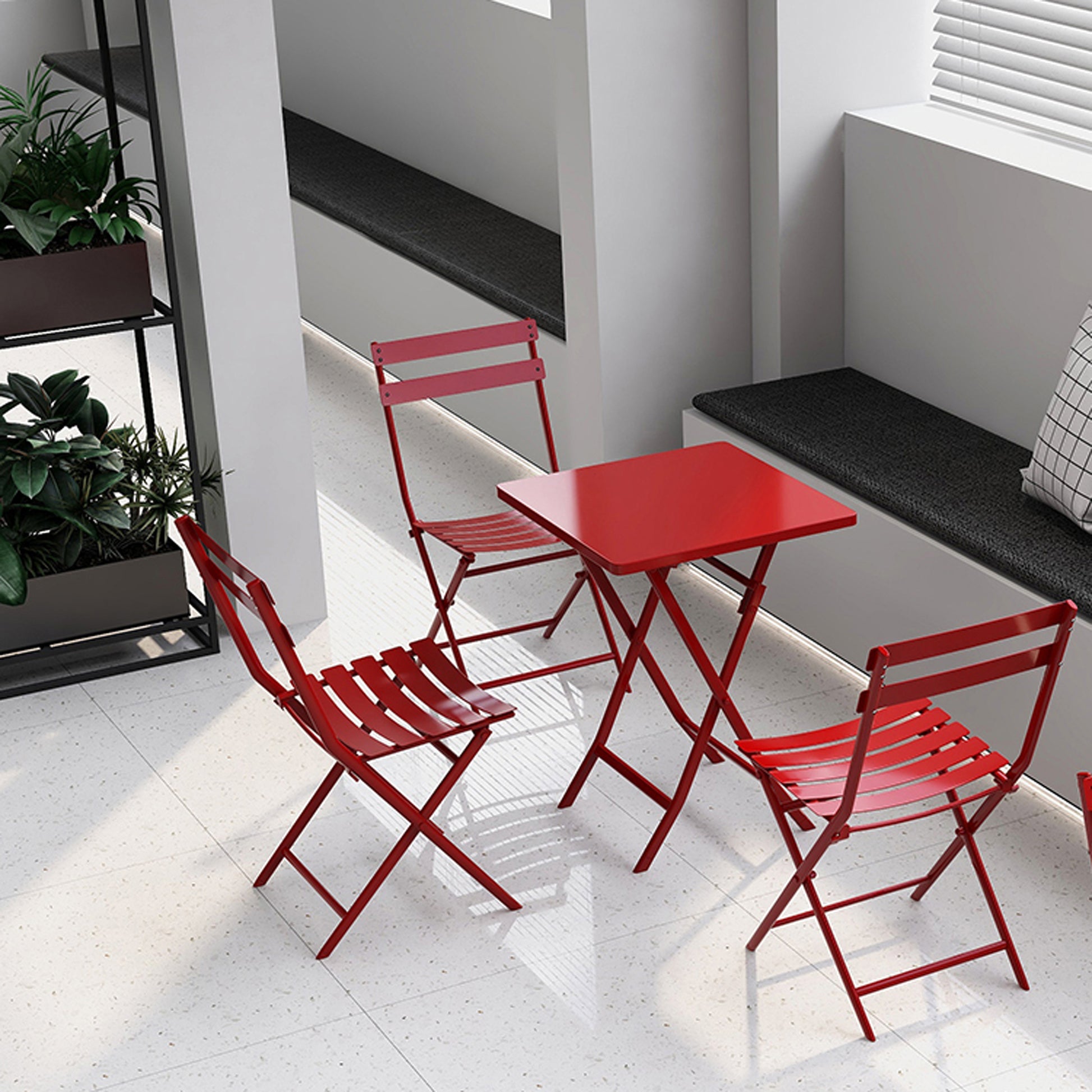 Red metal bistro set with folding chairs and square table for outdoor use