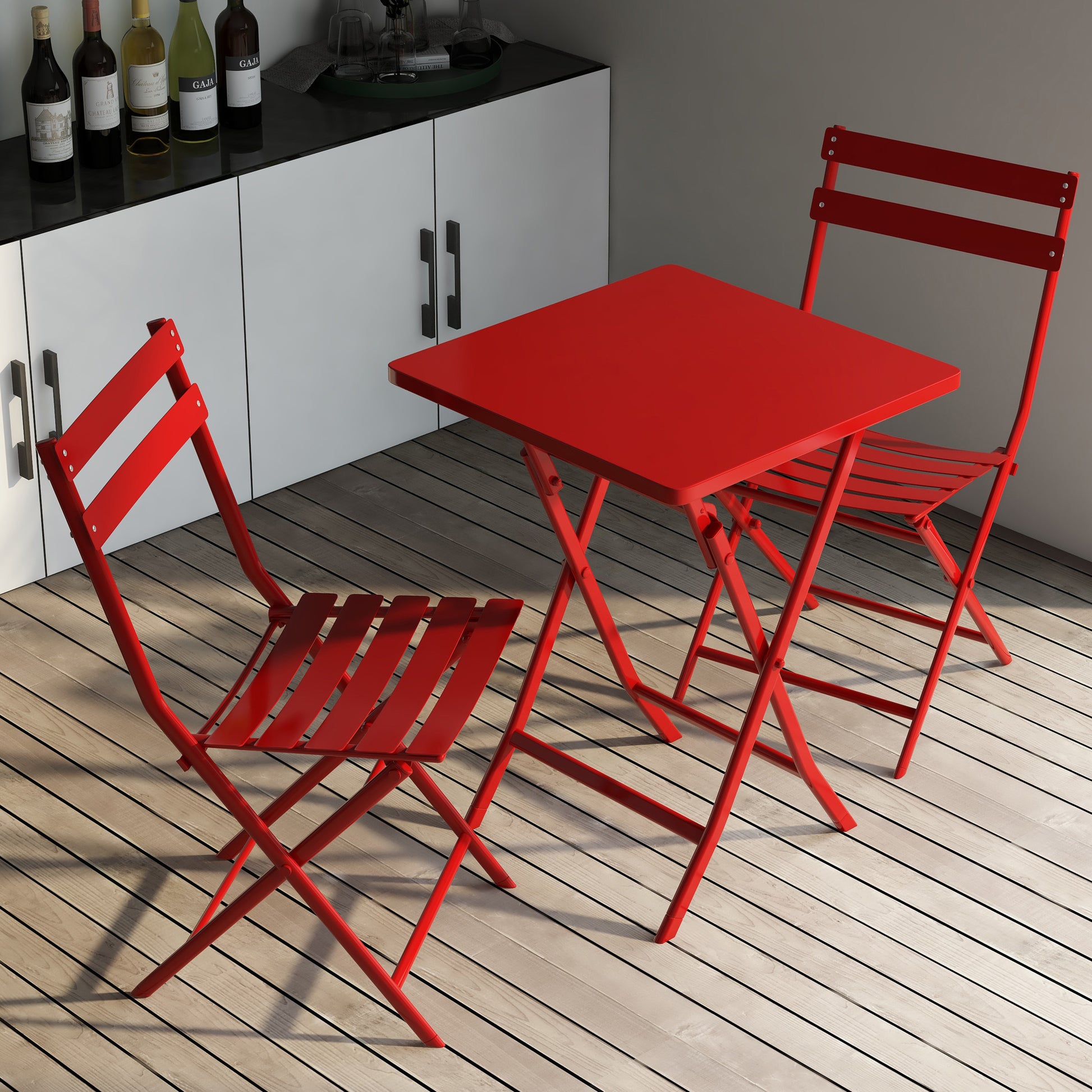 Red metal bistro set with folding chairs and square table perfect for small patios