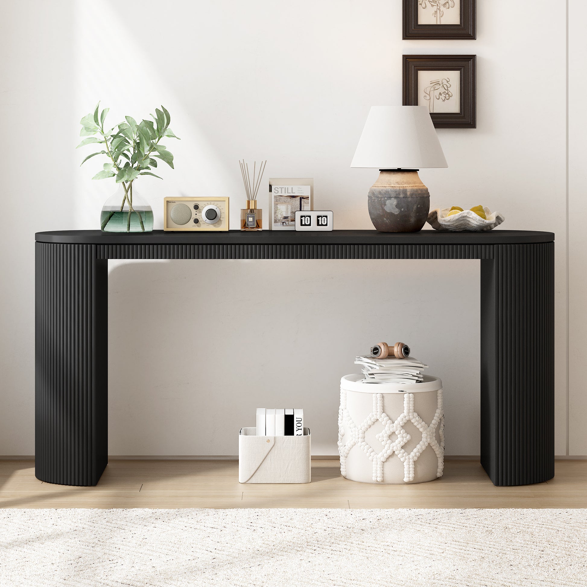 Black fluted console table with rounded edges perfect for entryways