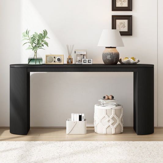 Black fluted console table with rounded edges perfect for entryways