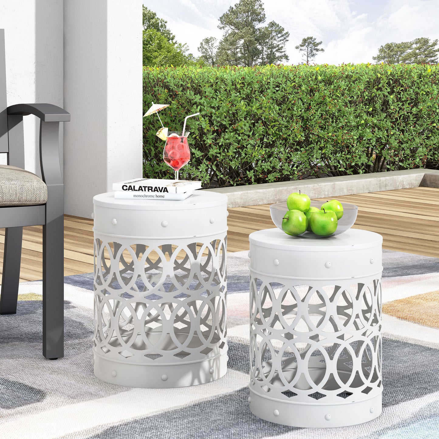 White metal garden stool with open geometric pattern perfect for outdoor accent