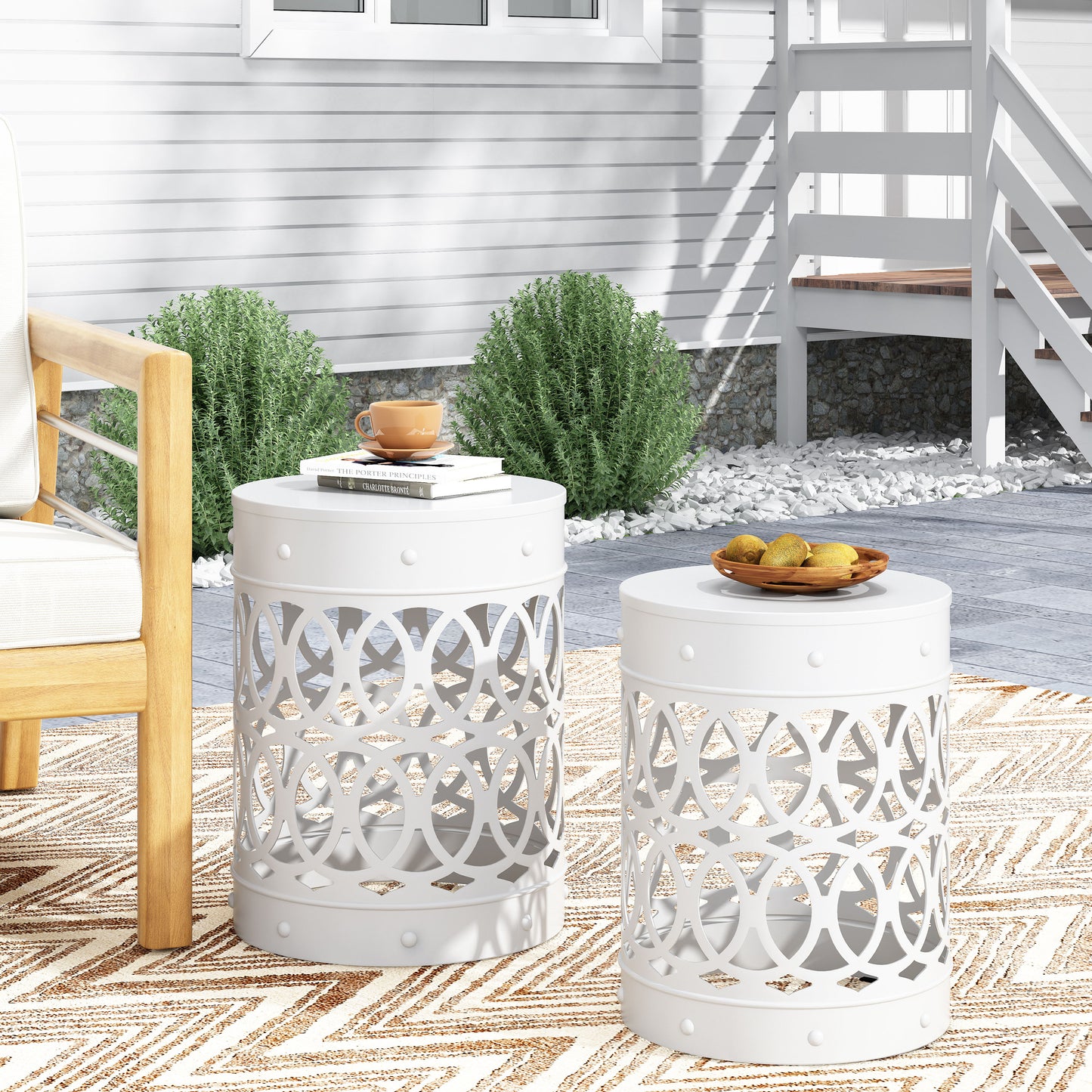White metal garden stool with geometric cutouts perfect for outdoor seating