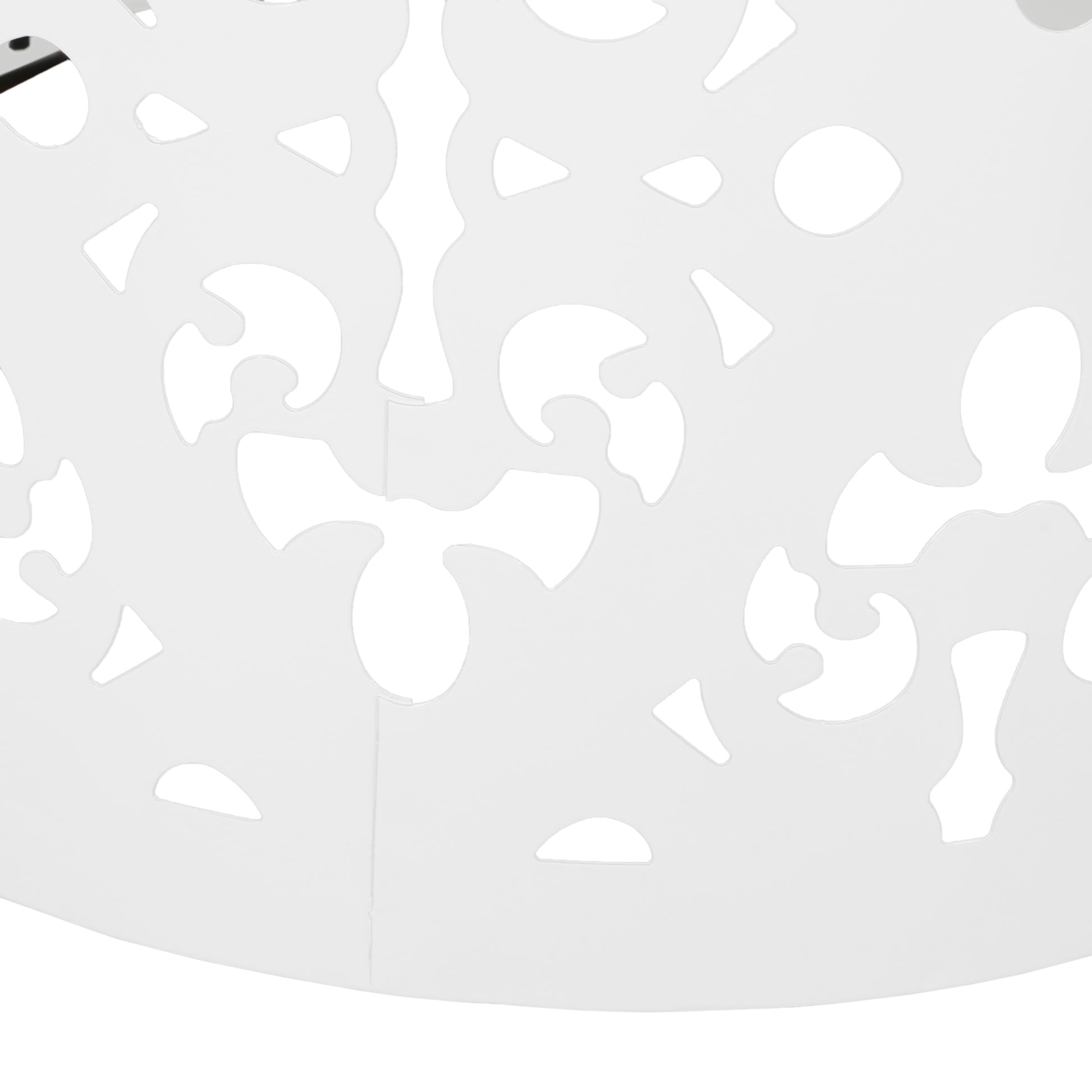 White decorative lampshade with intricate cutout pattern