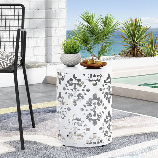 White metal patio side table with lasercut floral pattern for outdoor use