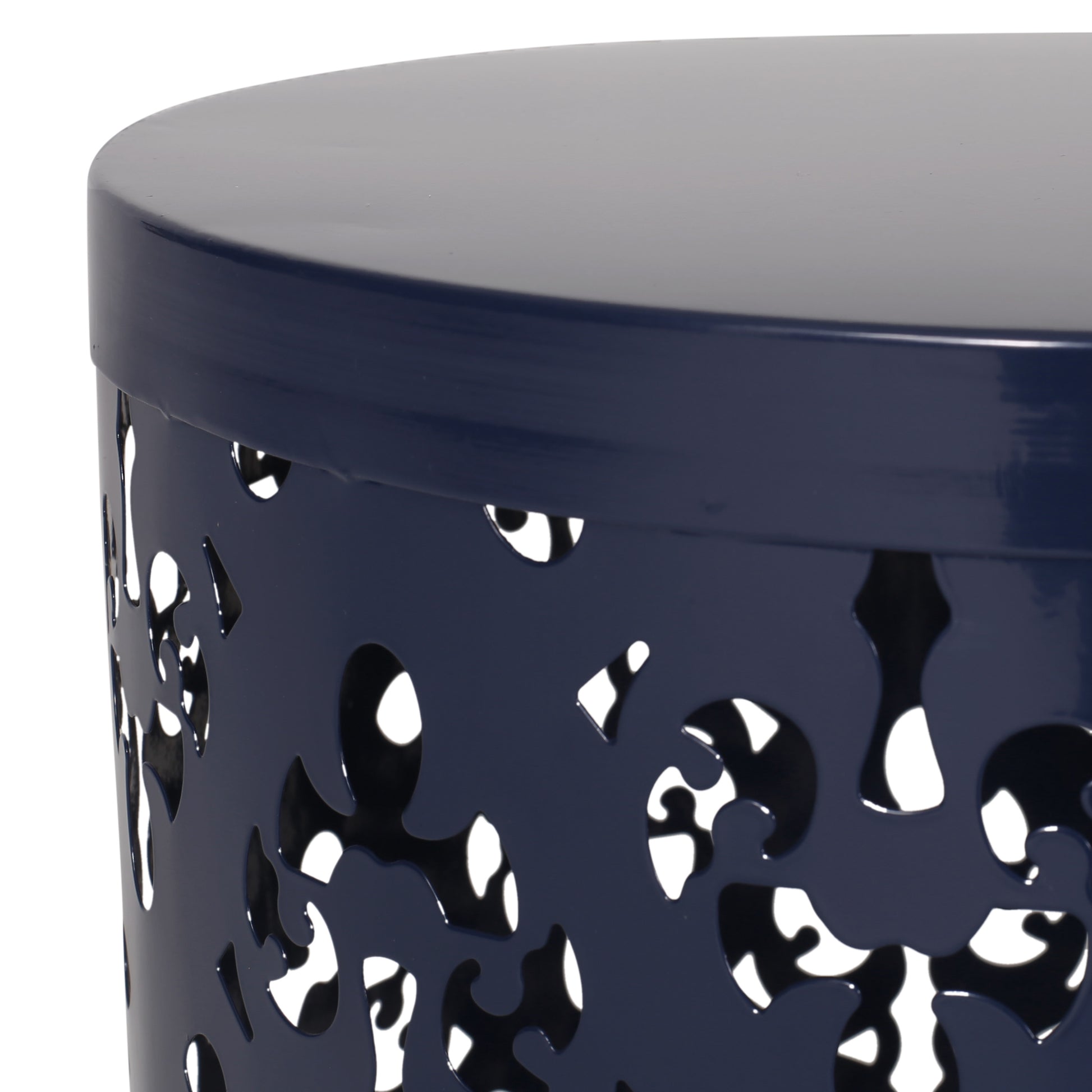 Navy blue metal side table with ornate cutout pattern perfect for outdoor seating