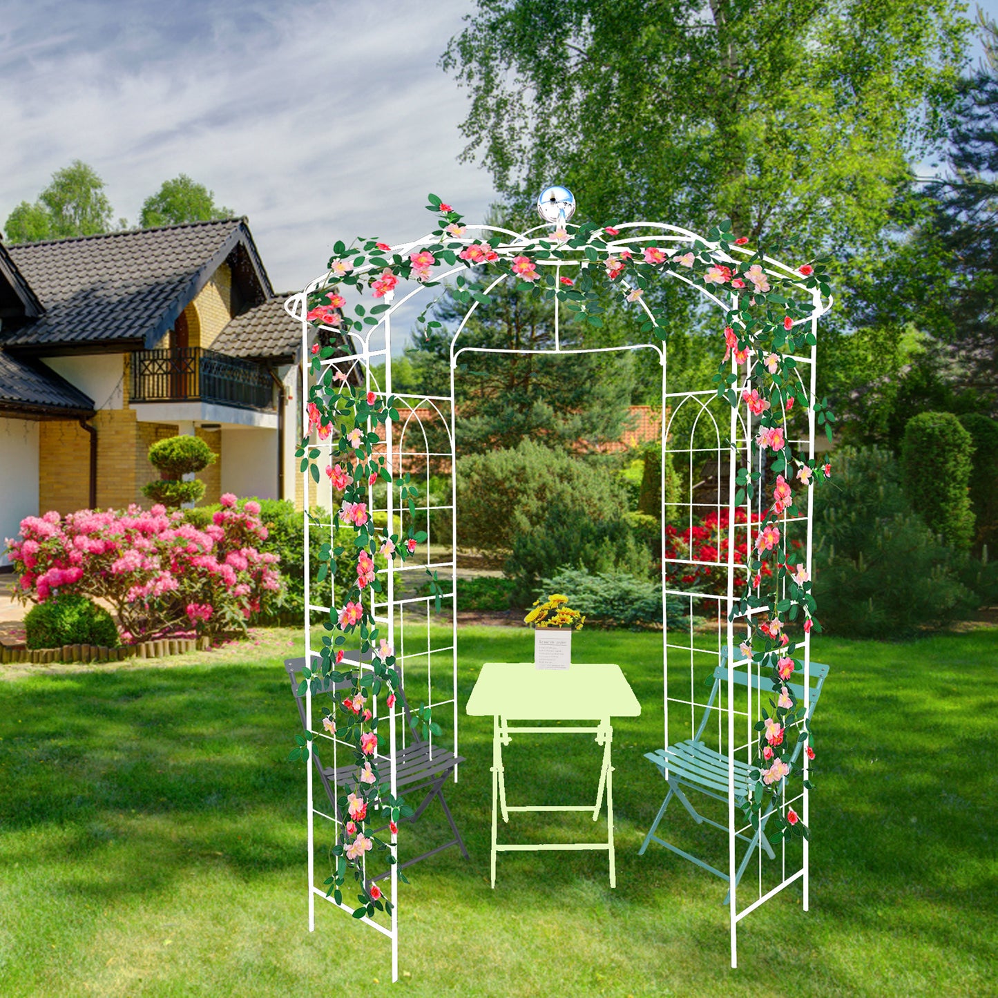 White metal garden arch with pink roses and chairs perfect for outdoor events
