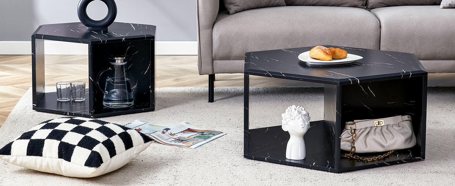 Black marble hexagonal side table with gold accents featuring a small pitcher and glasses inside