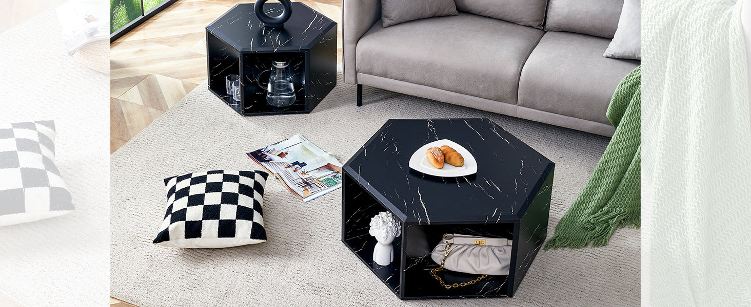 Black marble hexagonal accent table with storage holding a decanter and glasses