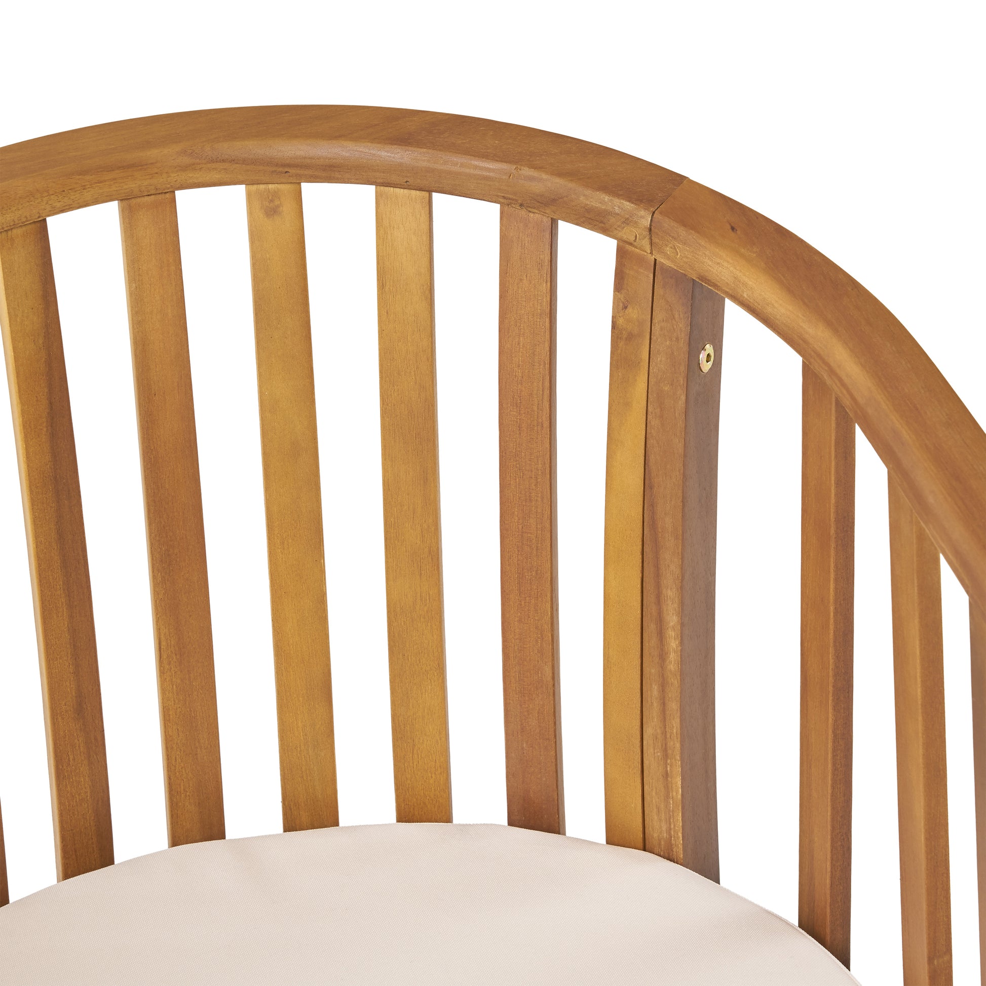 Curved wooden chair back with vertical slats and a cream seat cushion
