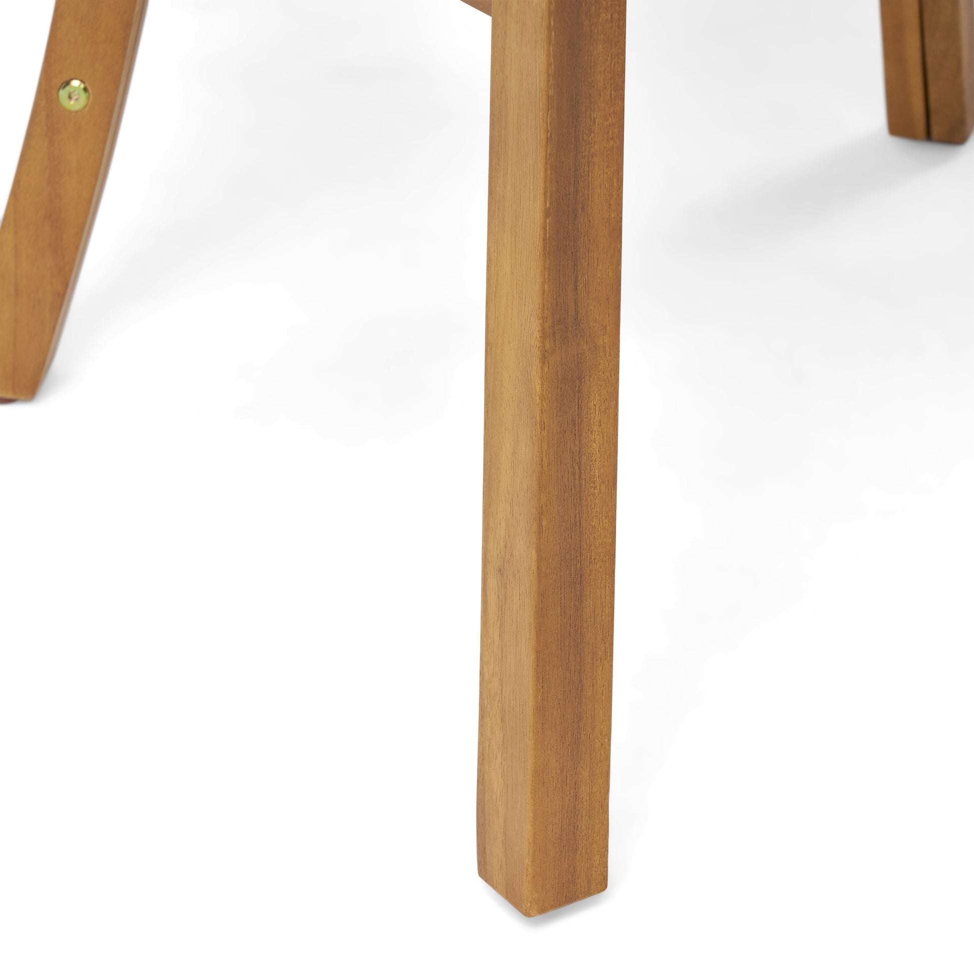 Closeup of a sturdy natural wood chair leg with visible grain Solid wood furniture